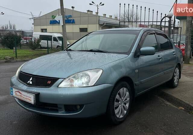 Зелений Міцубісі Lancer, об'ємом двигуна 1.6 л та пробігом 262 тис. км за 3999 $, фото 2 на Automoto.ua