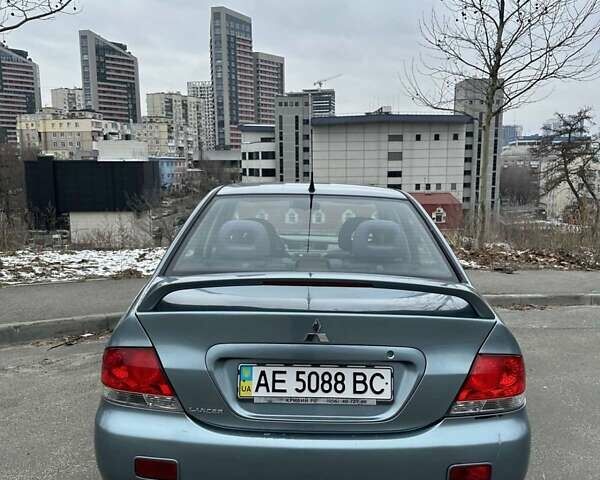 Зеленый Мицубиси Лансер, объемом двигателя 1.58 л и пробегом 207 тыс. км за 4200 $, фото 11 на Automoto.ua