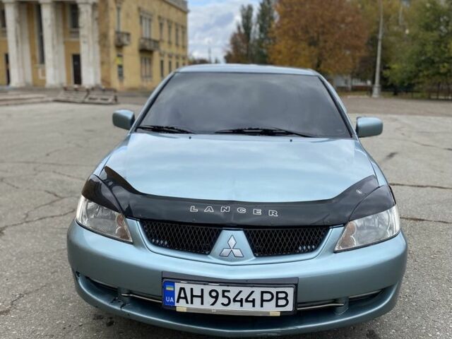 Зелений Міцубісі Lancer, об'ємом двигуна 1.6 л та пробігом 100 тис. км за 3700 $, фото 1 на Automoto.ua