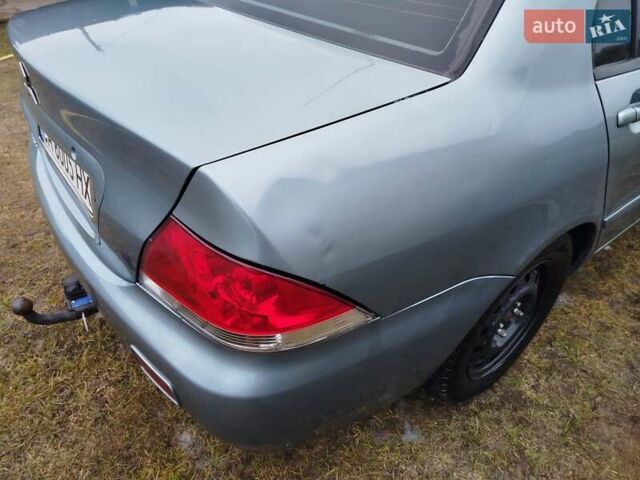 Зеленый Мицубиси Лансер, объемом двигателя 1.58 л и пробегом 224 тыс. км за 3500 $, фото 13 на Automoto.ua