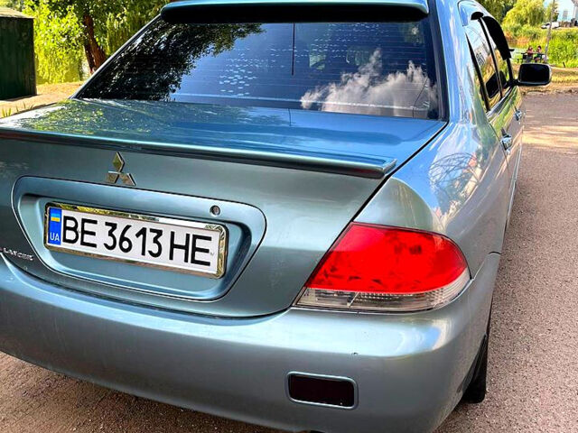 Зелений Міцубісі Lancer, об'ємом двигуна 1.6 л та пробігом 290 тис. км за 4450 $, фото 6 на Automoto.ua