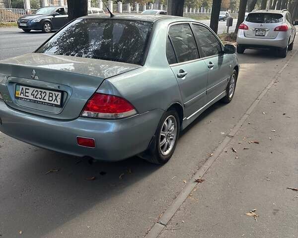 Зелений Міцубісі Lancer, об'ємом двигуна 1.6 л та пробігом 203 тис. км за 4500 $, фото 3 на Automoto.ua