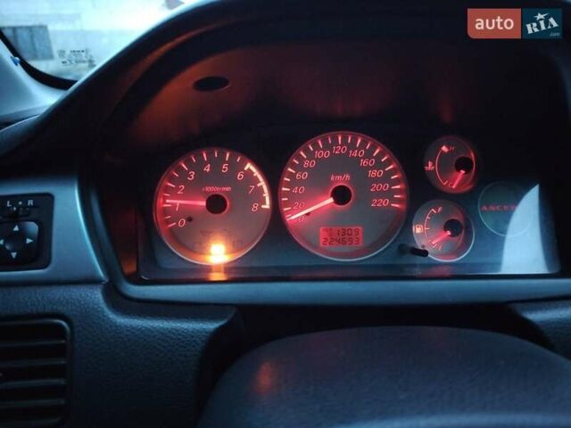 Зеленый Мицубиси Лансер, объемом двигателя 1.58 л и пробегом 224 тыс. км за 3500 $, фото 4 на Automoto.ua