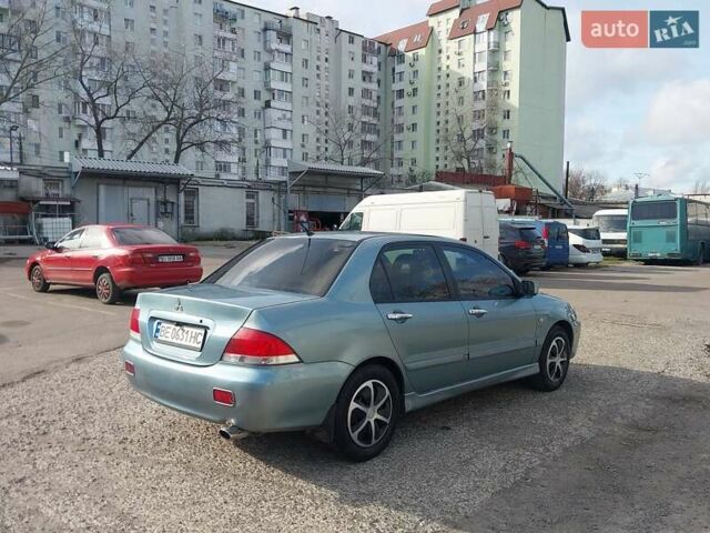 Зелений Міцубісі Lancer, об'ємом двигуна 1.58 л та пробігом 272 тис. км за 3800 $, фото 10 на Automoto.ua
