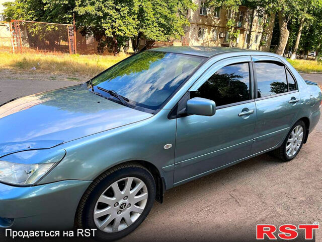 Зелений Міцубісі Lancer, об'ємом двигуна 1.6 л та пробігом 290 тис. км за 4450 $, фото 3 на Automoto.ua