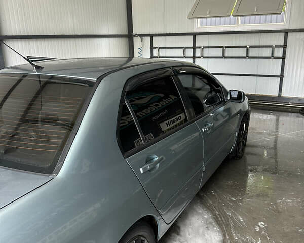 Зелений Міцубісі Lancer, об'ємом двигуна 1.6 л та пробігом 250 тис. км за 5300 $, фото 2 на Automoto.ua