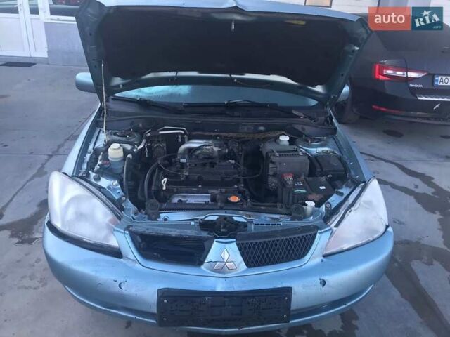 Зеленый Мицубиси Лансер, объемом двигателя 1.6 л и пробегом 184 тыс. км за 2000 $, фото 8 на Automoto.ua