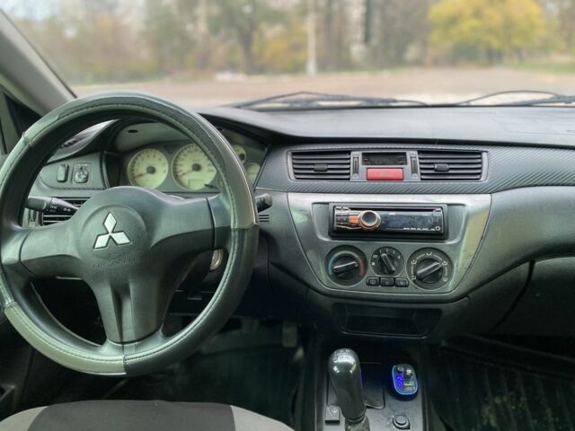 Зелений Міцубісі Lancer, об'ємом двигуна 1.6 л та пробігом 100 тис. км за 3700 $, фото 6 на Automoto.ua