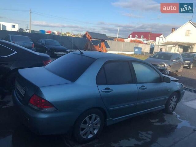 Зеленый Мицубиси Лансер, объемом двигателя 1.6 л и пробегом 184 тыс. км за 2000 $, фото 3 на Automoto.ua