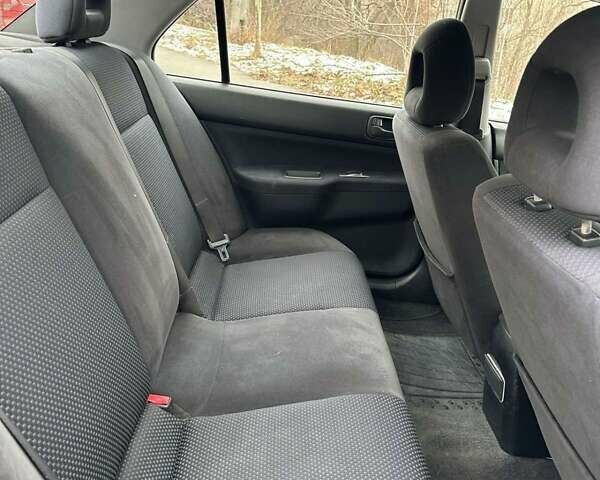 Зеленый Мицубиси Лансер, объемом двигателя 1.58 л и пробегом 207 тыс. км за 4200 $, фото 13 на Automoto.ua