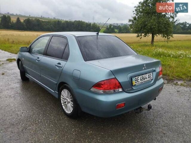 Зеленый Мицубиси Лансер, объемом двигателя 1.6 л и пробегом 135 тыс. км за 6931 $, фото 1 на Automoto.ua