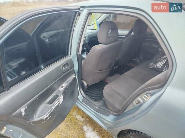 Зеленый Мицубиси Лансер, объемом двигателя 1.58 л и пробегом 224 тыс. км за 3500 $, фото 14 на Automoto.ua