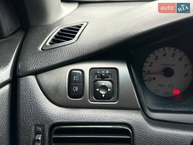 Зелений Міцубісі Lancer, об'ємом двигуна 1.58 л та пробігом 208 тис. км за 3990 $, фото 16 на Automoto.ua