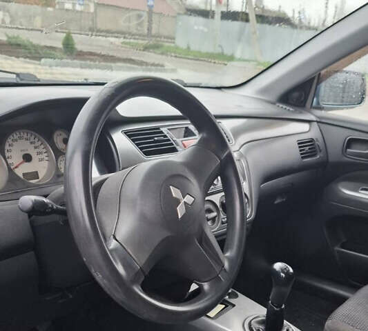 Зелений Міцубісі Lancer, об'ємом двигуна 1.6 л та пробігом 265 тис. км за 3800 $, фото 4 на Automoto.ua