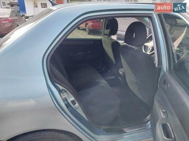 Зелений Міцубісі Lancer, об'ємом двигуна 1.58 л та пробігом 272 тис. км за 3800 $, фото 21 на Automoto.ua