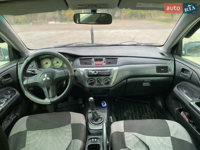 Міцубісі Lancer 2006 у Краматорске на Automoto.ua Зелений Міцубісі Lancer, об'ємом двигуна 1.58 л та пробігом 100 тис. км за 3700 $, фото 5 на Automoto.ua