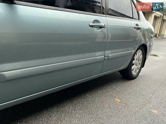 Зелений Міцубісі Lancer, об'ємом двигуна 1.6 л та пробігом 250 тис. км за 2950 $, фото 12 на Automoto.ua