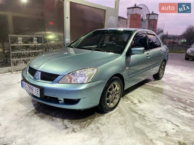 Зеленый Мицубиси Лансер, объемом двигателя 1.58 л и пробегом 352 тыс. км за 3700 $, фото 6 на Automoto.ua