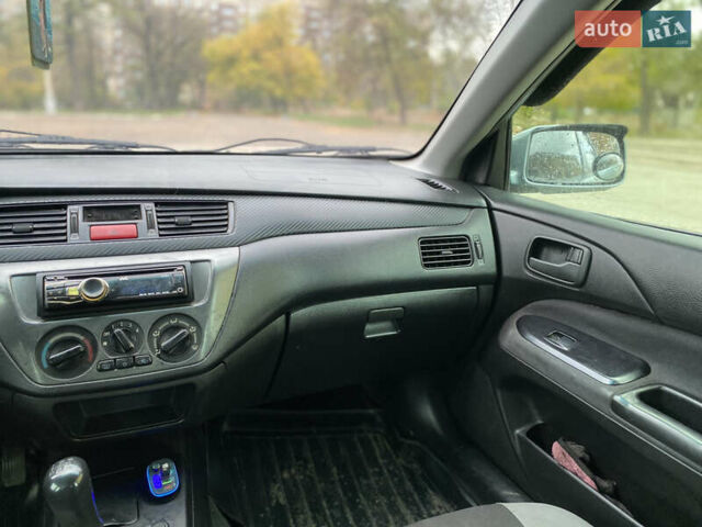 Міцубісі Lancer 2006 у Краматорске на Automoto.ua Зелений Міцубісі Lancer, об'ємом двигуна 1.58 л та пробігом 100 тис. км за 3700 $, фото 7 на Automoto.ua