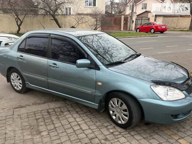 Зелений Міцубісі Lancer, об'ємом двигуна 0 л та пробігом 176 тис. км за 4900 $, фото 5 на Automoto.ua