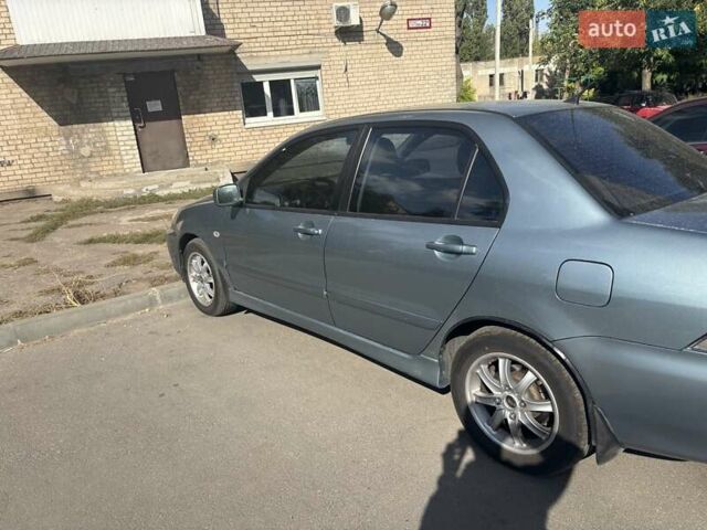 Зелений Міцубісі Lancer, об'ємом двигуна 1.6 л та пробігом 203 тис. км за 4500 $, фото 1 на Automoto.ua