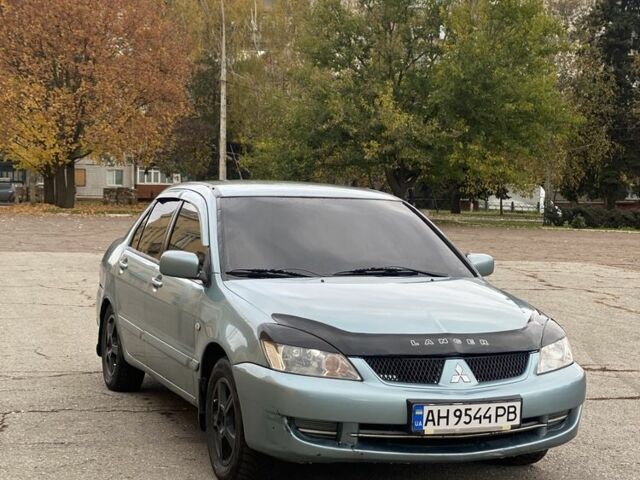 Зелений Міцубісі Lancer, об'ємом двигуна 1.6 л та пробігом 100 тис. км за 3700 $, фото 2 на Automoto.ua