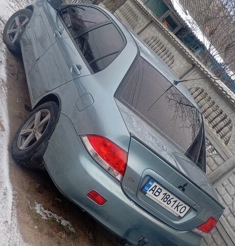 Зелений Міцубісі Lancer, об'ємом двигуна 1.6 л та пробігом 320 тис. км за 4500 $, фото 1 на Automoto.ua