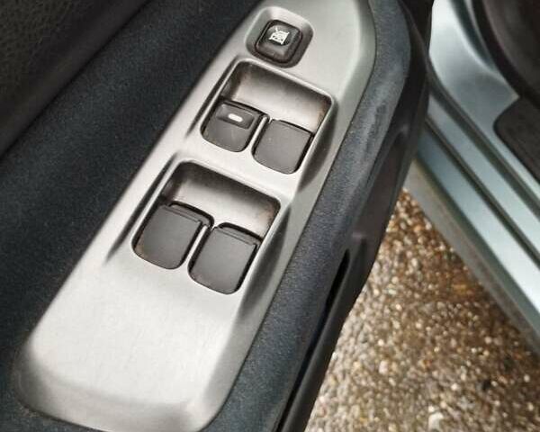 Зеленый Мицубиси Лансер, объемом двигателя 1.6 л и пробегом 135 тыс. км за 6931 $, фото 7 на Automoto.ua