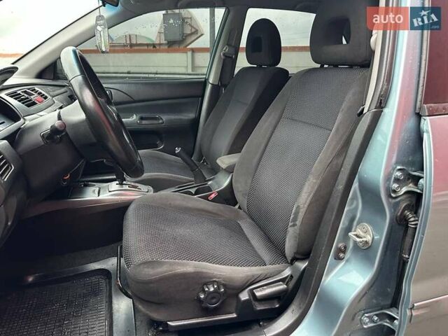 Зелений Міцубісі Lancer, об'ємом двигуна 1.58 л та пробігом 208 тис. км за 3990 $, фото 8 на Automoto.ua