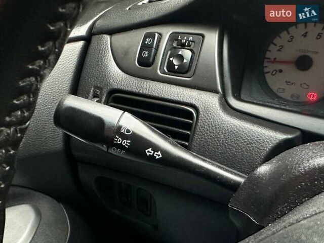 Зелений Міцубісі Lancer, об'ємом двигуна 1.58 л та пробігом 208 тис. км за 3990 $, фото 21 на Automoto.ua