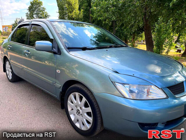 Зелений Міцубісі Lancer, об'ємом двигуна 1.6 л та пробігом 290 тис. км за 4450 $, фото 2 на Automoto.ua