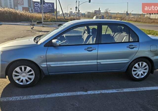 Зелений Міцубісі Lancer, об'ємом двигуна 1.58 л та пробігом 215 тис. км за 5000 $, фото 5 на Automoto.ua