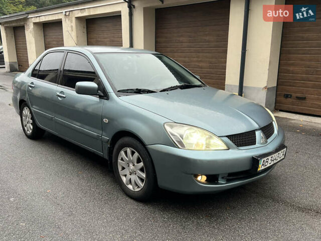 Зелений Міцубісі Lancer, об'ємом двигуна 1.6 л та пробігом 250 тис. км за 2950 $, фото 1 на Automoto.ua