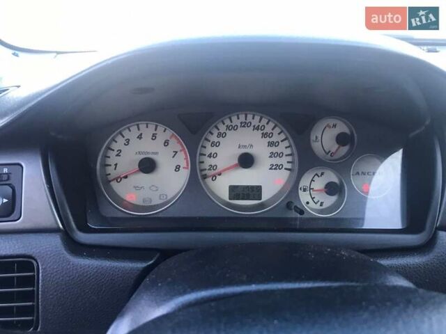 Зеленый Мицубиси Лансер, объемом двигателя 1.6 л и пробегом 184 тыс. км за 2000 $, фото 4 на Automoto.ua