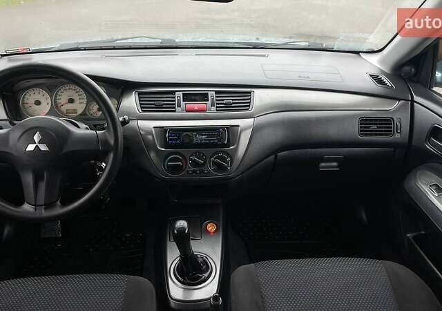 Зелений Міцубісі Lancer, об'ємом двигуна 1.6 л та пробігом 262 тис. км за 3999 $, фото 15 на Automoto.ua