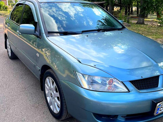 Зелений Міцубісі Lancer, об'ємом двигуна 1.6 л та пробігом 290 тис. км за 4450 $, фото 8 на Automoto.ua