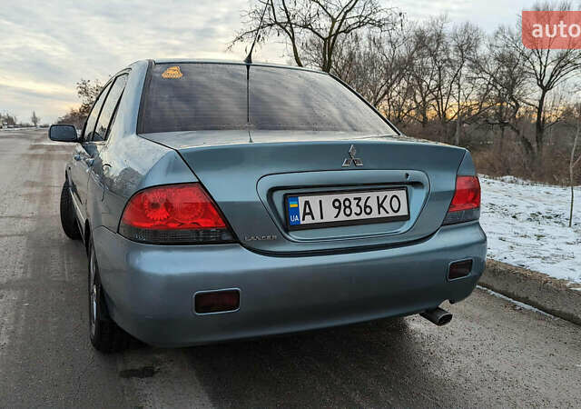 Зелений Міцубісі Lancer, об'ємом двигуна 1.6 л та пробігом 320 тис. км за 4500 $, фото 3 на Automoto.ua