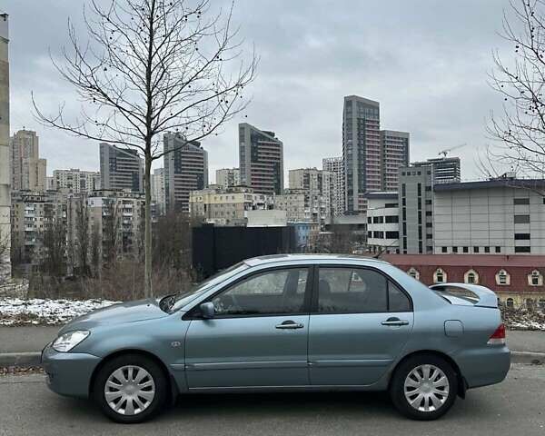 Зеленый Мицубиси Лансер, объемом двигателя 1.58 л и пробегом 207 тыс. км за 4200 $, фото 8 на Automoto.ua