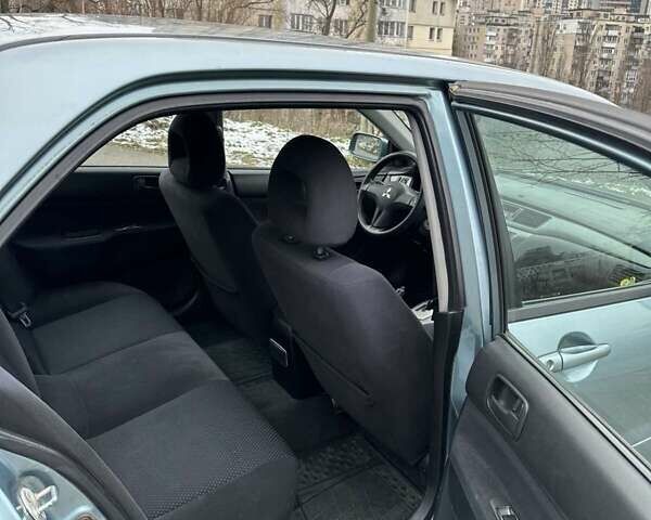 Зеленый Мицубиси Лансер, объемом двигателя 1.58 л и пробегом 207 тыс. км за 4200 $, фото 16 на Automoto.ua