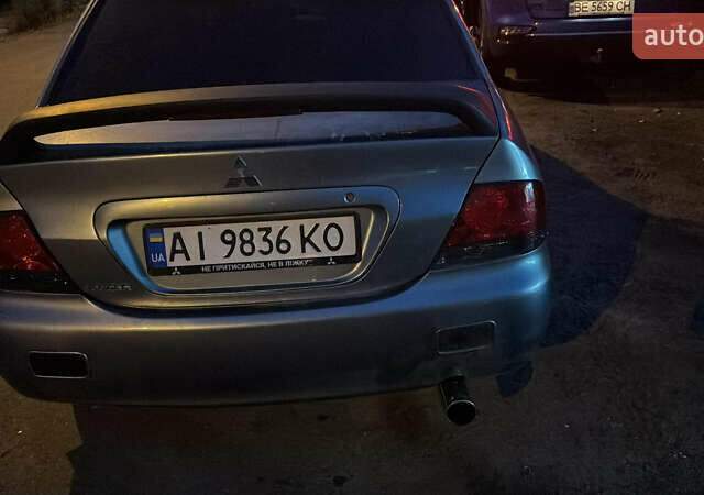 Зелений Міцубісі Lancer, об'ємом двигуна 1.6 л та пробігом 320 тис. км за 4500 $, фото 4 на Automoto.ua