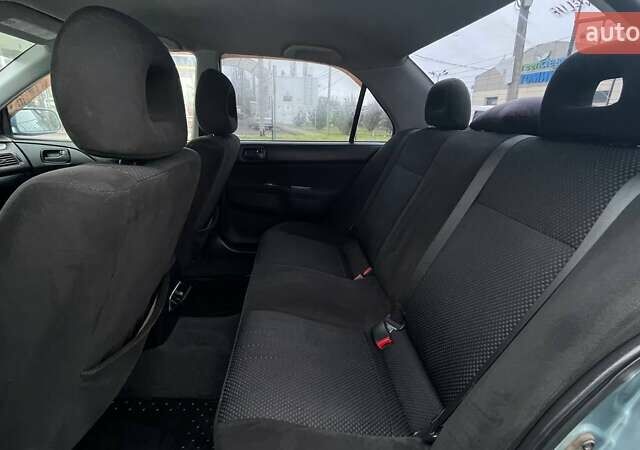 Зелений Міцубісі Lancer, об'ємом двигуна 1.6 л та пробігом 262 тис. км за 3999 $, фото 21 на Automoto.ua