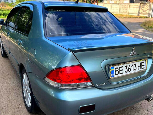 Зелений Міцубісі Lancer, об'ємом двигуна 1.6 л та пробігом 290 тис. км за 4450 $, фото 4 на Automoto.ua