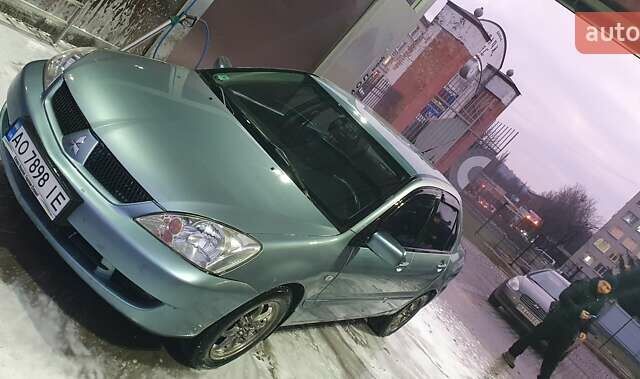 Зеленый Мицубиси Лансер, объемом двигателя 1.58 л и пробегом 352 тыс. км за 3700 $, фото 1 на Automoto.ua