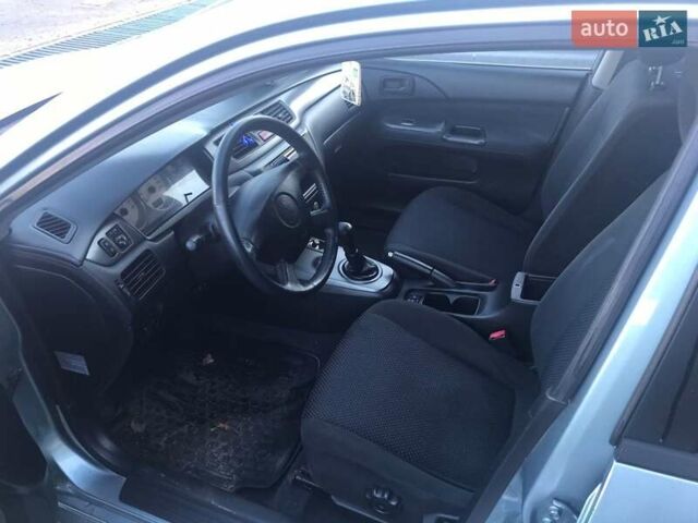 Зеленый Мицубиси Лансер, объемом двигателя 1.6 л и пробегом 184 тыс. км за 2000 $, фото 1 на Automoto.ua