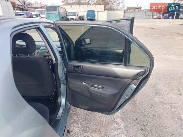 Зелений Міцубісі Lancer, об'ємом двигуна 1.58 л та пробігом 272 тис. км за 3800 $, фото 20 на Automoto.ua