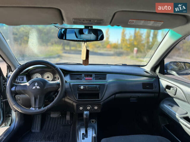 Мицубиси Лансер 2006 в Николаеве на Automoto.ua Зеленый Мицубиси Лансер, объемом двигателя 1.58 л и пробегом 271 тыс. км за 4599 $, фото 19 на Automoto.ua