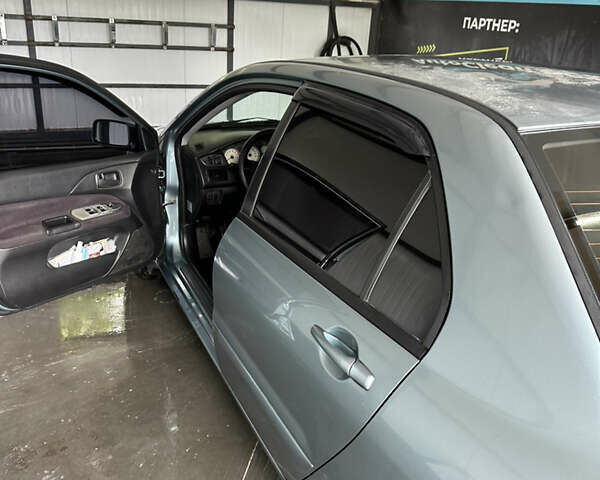Зелений Міцубісі Lancer, об'ємом двигуна 1.6 л та пробігом 250 тис. км за 5300 $, фото 1 на Automoto.ua