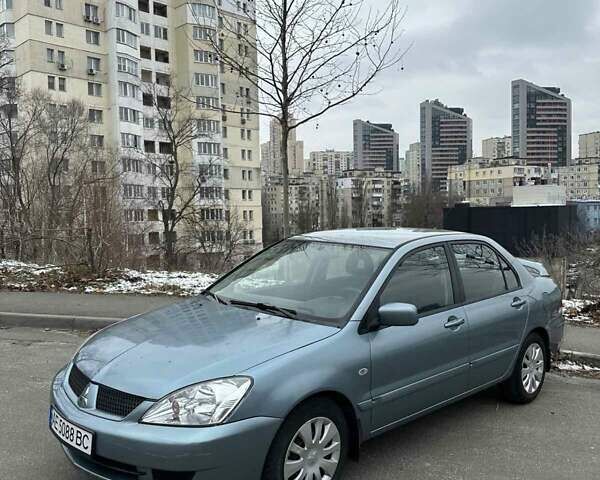 Зеленый Мицубиси Лансер, объемом двигателя 1.58 л и пробегом 207 тыс. км за 4200 $, фото 5 на Automoto.ua