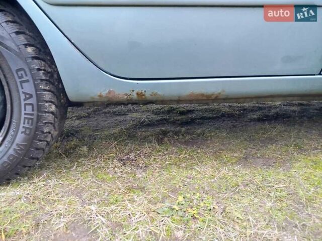 Зеленый Мицубиси Лансер, объемом двигателя 1.58 л и пробегом 224 тыс. км за 3500 $, фото 5 на Automoto.ua