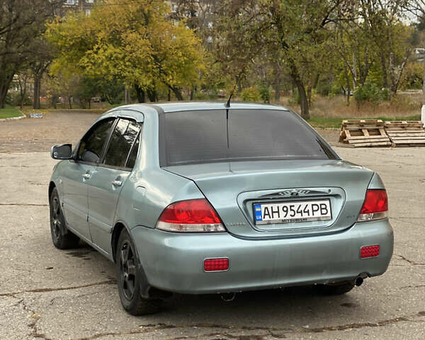 Міцубісі Lancer 2006 у Краматорске на Automoto.ua Зелений Міцубісі Lancer, об'ємом двигуна 1.58 л та пробігом 100 тис. км за 3700 $, фото 4 на Automoto.ua